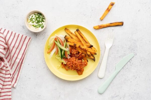 Kids- Kapsalon van zoete aardappelfriet en gestoofde kip