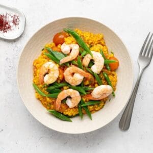 Paella met gamba’s en snijbonen