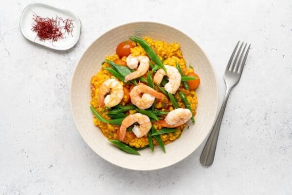 Paella met gamba’s en snijbonen